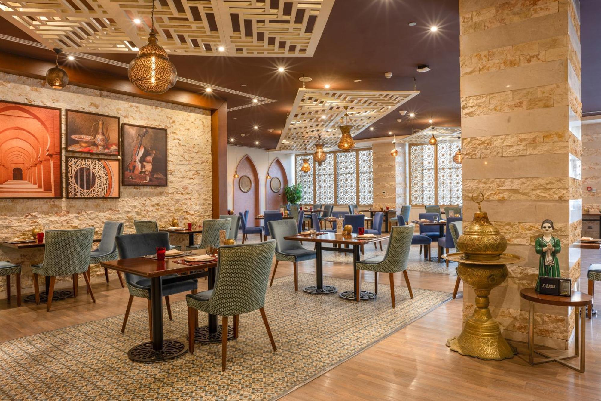 Triumph Luxury Hotel Kaherah Luaran gambar Restaurant