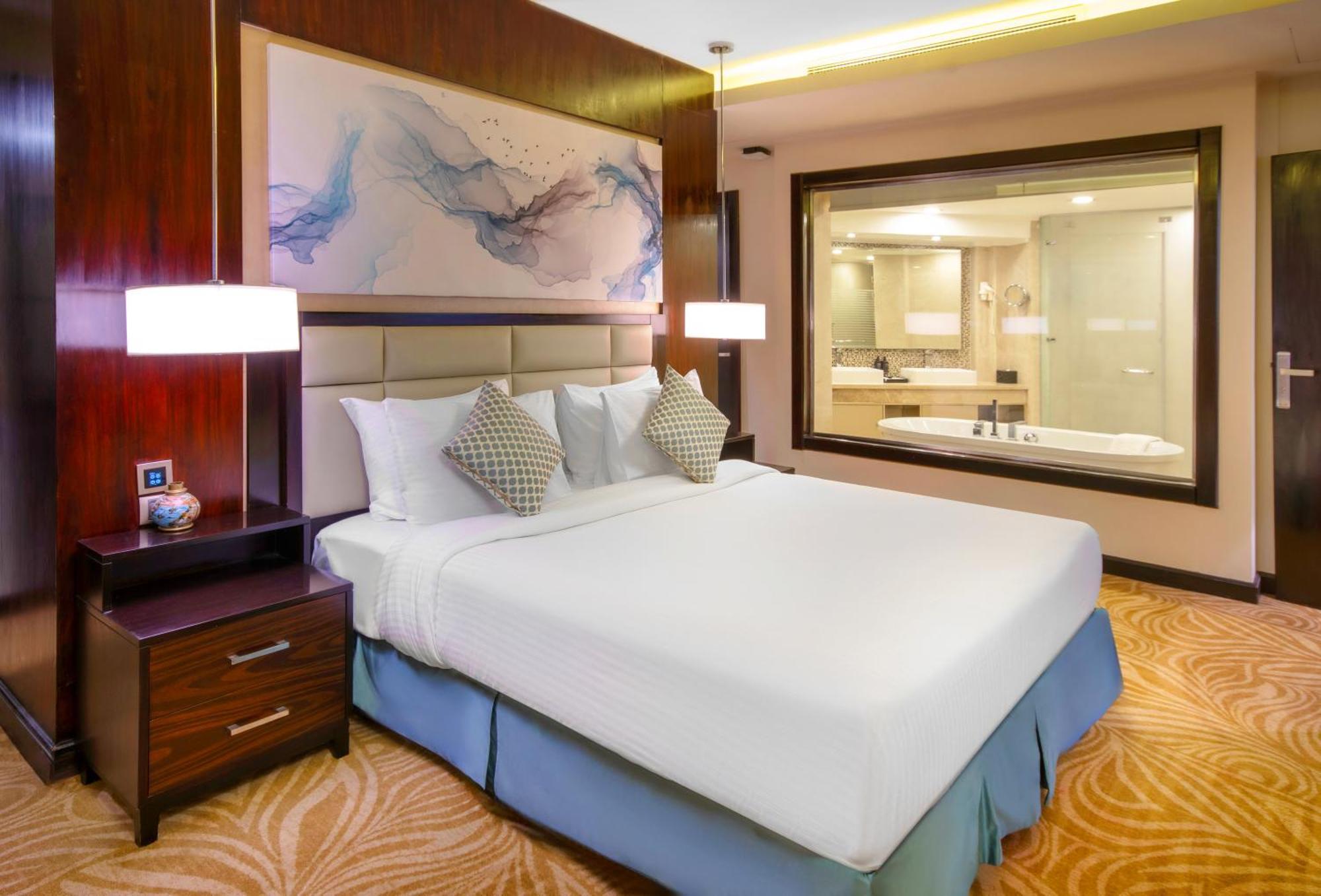 Triumph Luxury Hotel Kaherah Bilik gambar A bedroom at the hotel